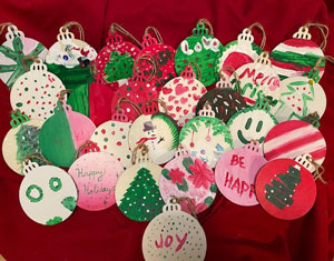 Hand decorated ornaments for the Kindness Tree in Capstone