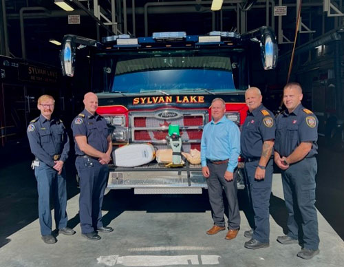 Donovan Brandon, RDES, Asst. Deputy Chief Curtis Schaefer (RDES), Ron Lebsack (Town of Sylvan Lake), Chief Cliff Brausen (SLFD), Deputy Chief Steve Scanland (SLFD)